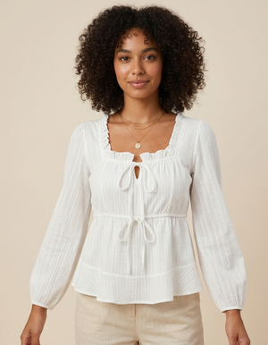 Clara | Blusa romántica con lazos y manga larga