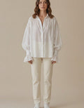 Joana | Blusa amplia con manga globo y volante - Blanco